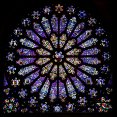 © Wikimedia Commons_The north transept rose features the Tree of Jesse._Tree of Jesse_The_north_transept_rose_window_at_St-Denis